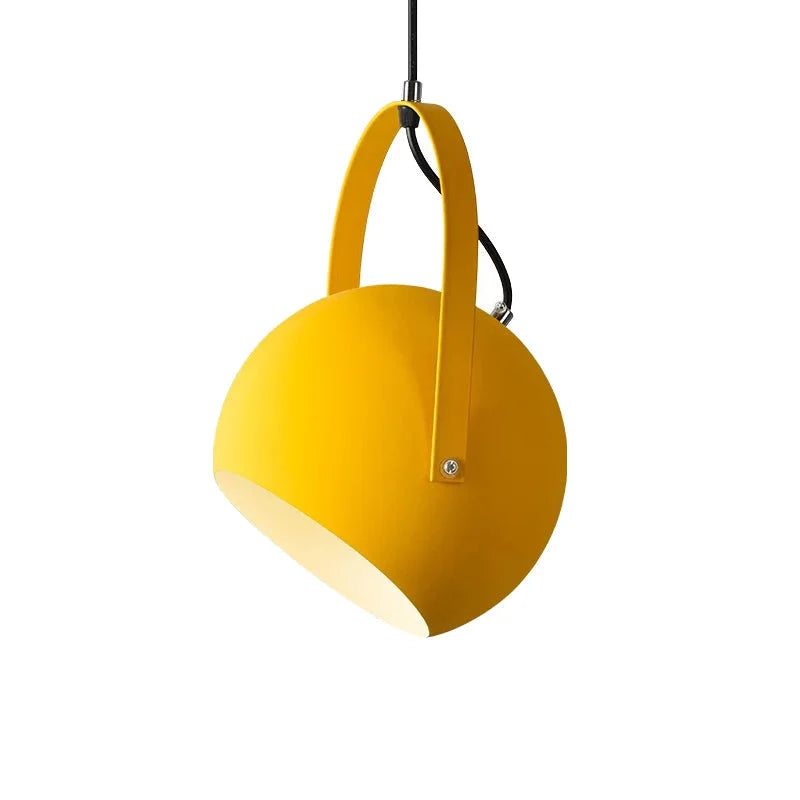 Ball pendant light viewed from below with a warm inner glow