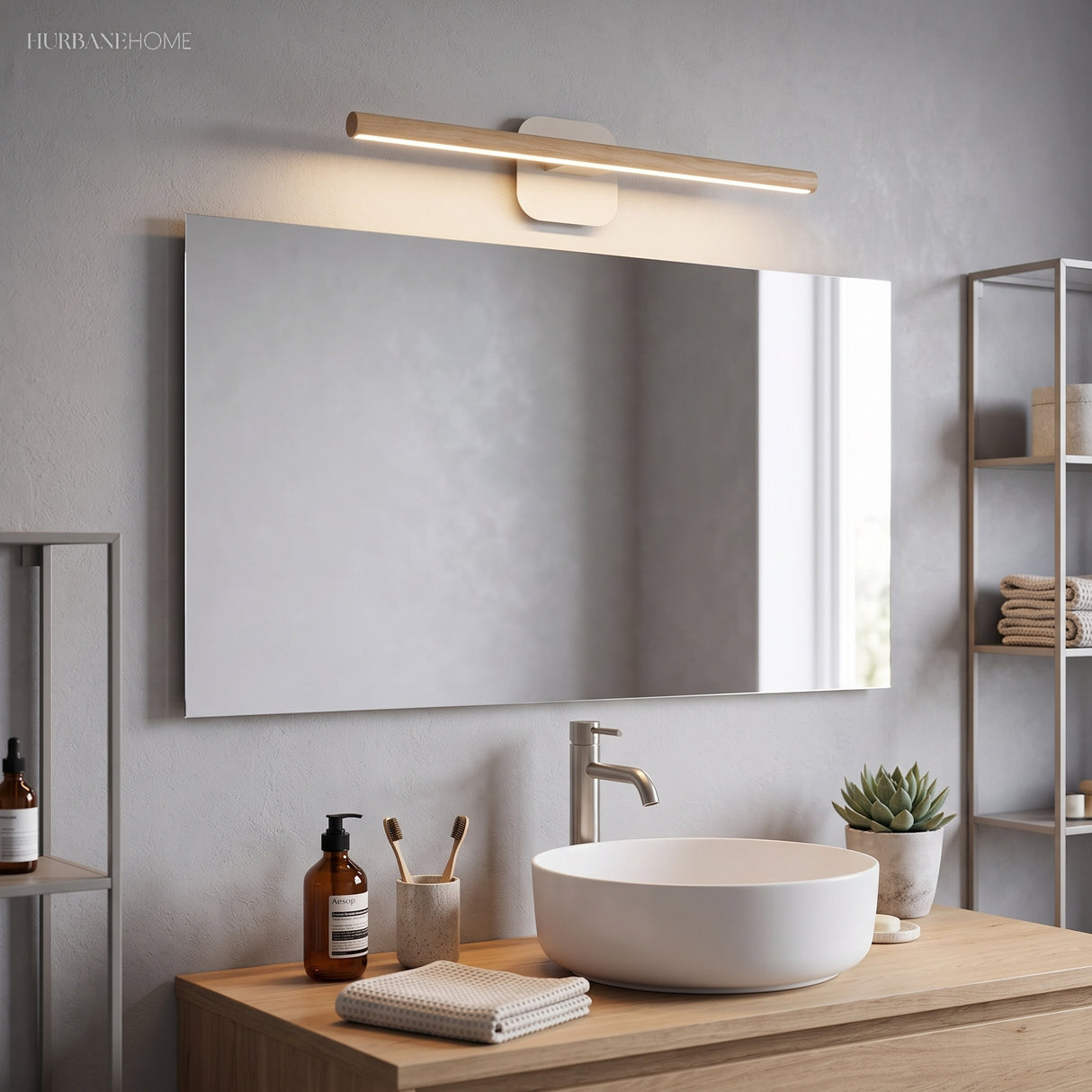Slim wood vanity light above a wide mirror and a timber vanity