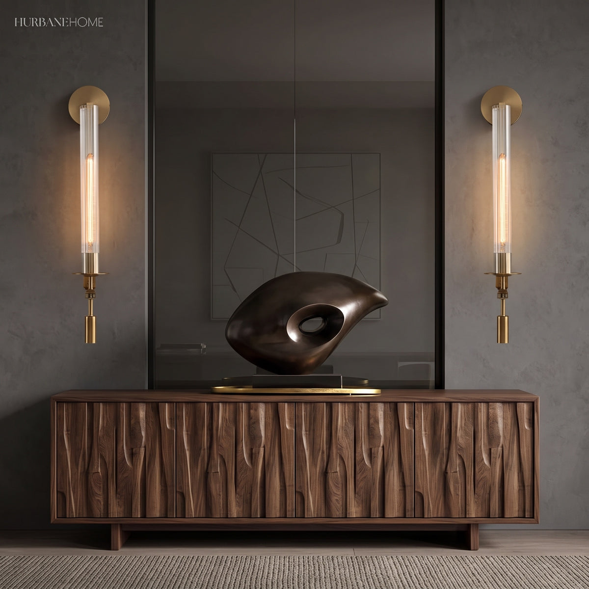 Two gold fluted glass sconces flanking a mirror and sideboard