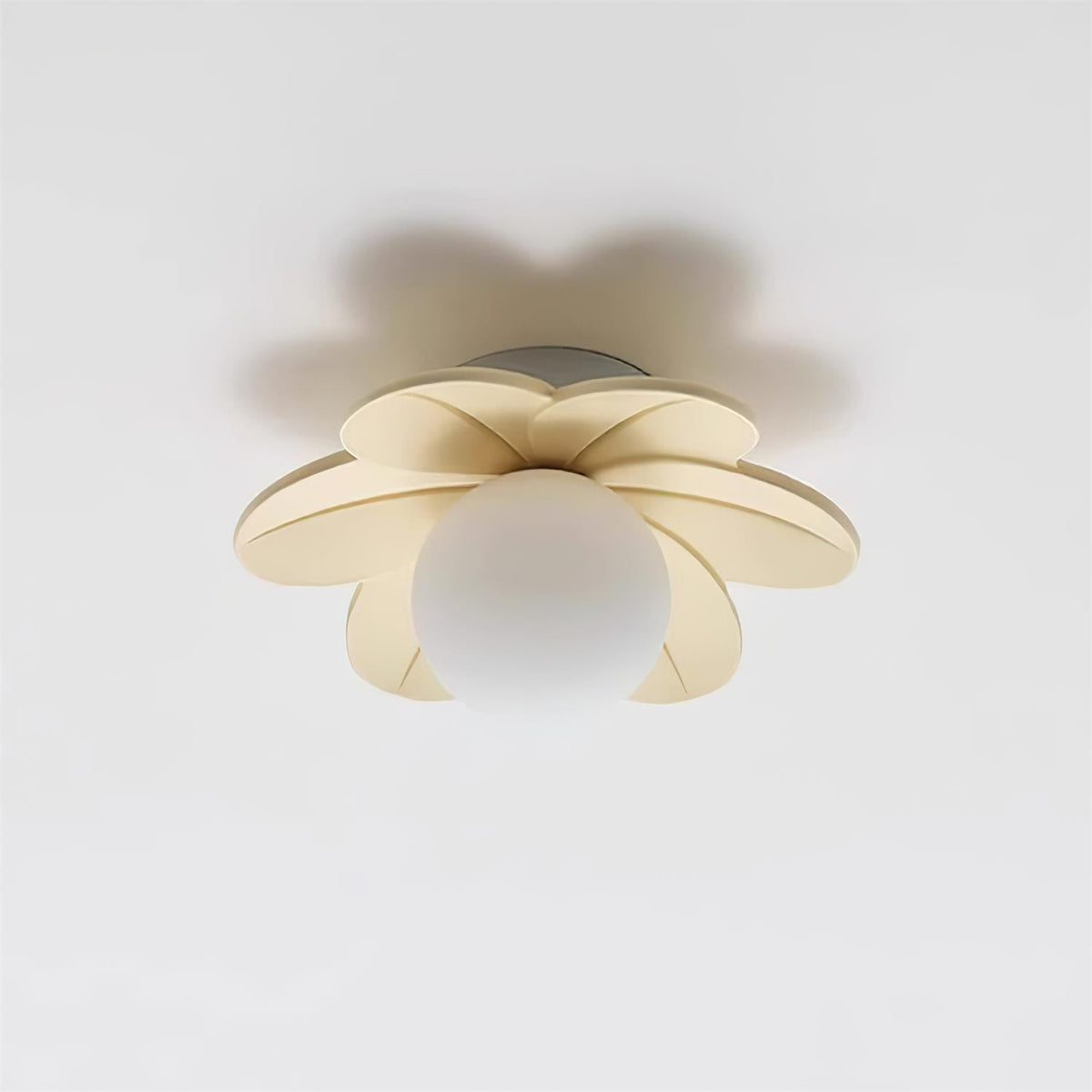 Beige flower ceiling light seen from an angle showing the depth of the petals