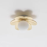 Beige flower ceiling light seen from an angle showing the depth of the petals