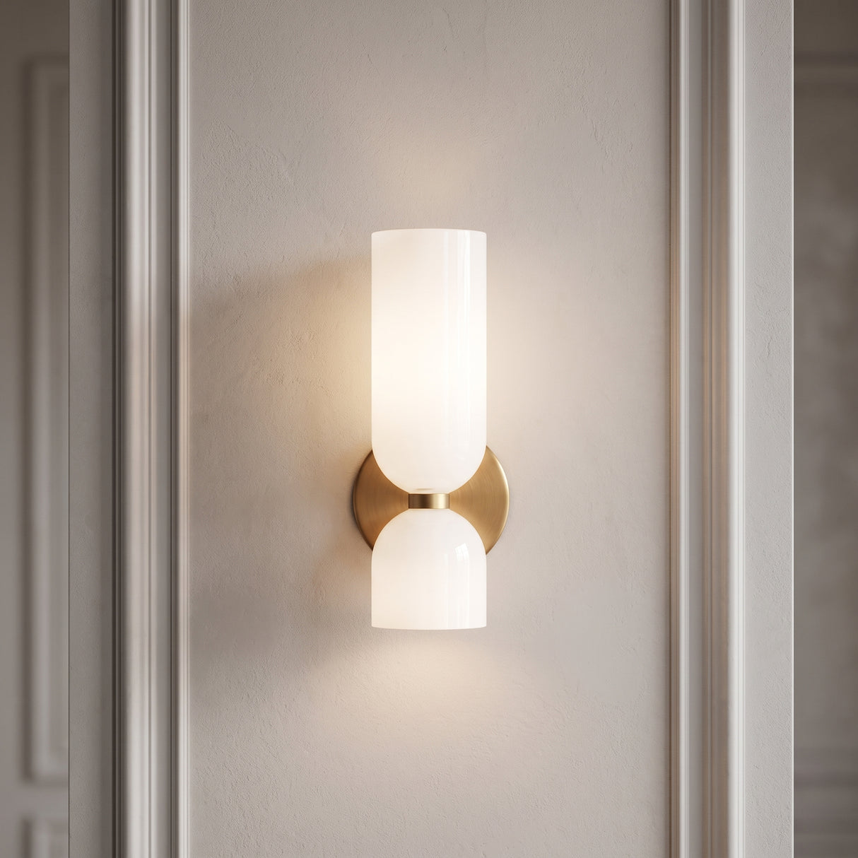 Double head glass wall sconce with brass fitting, front product view