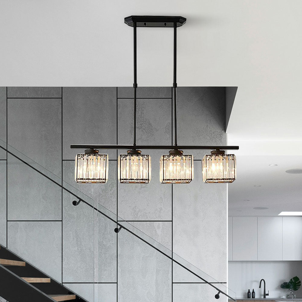 Black four light island chandelier beside a staircase in an open plan home