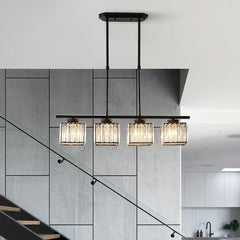 Black four light island chandelier beside a staircase in an open plan home