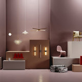 Contemporary fixture showcasing black and brass vanity light