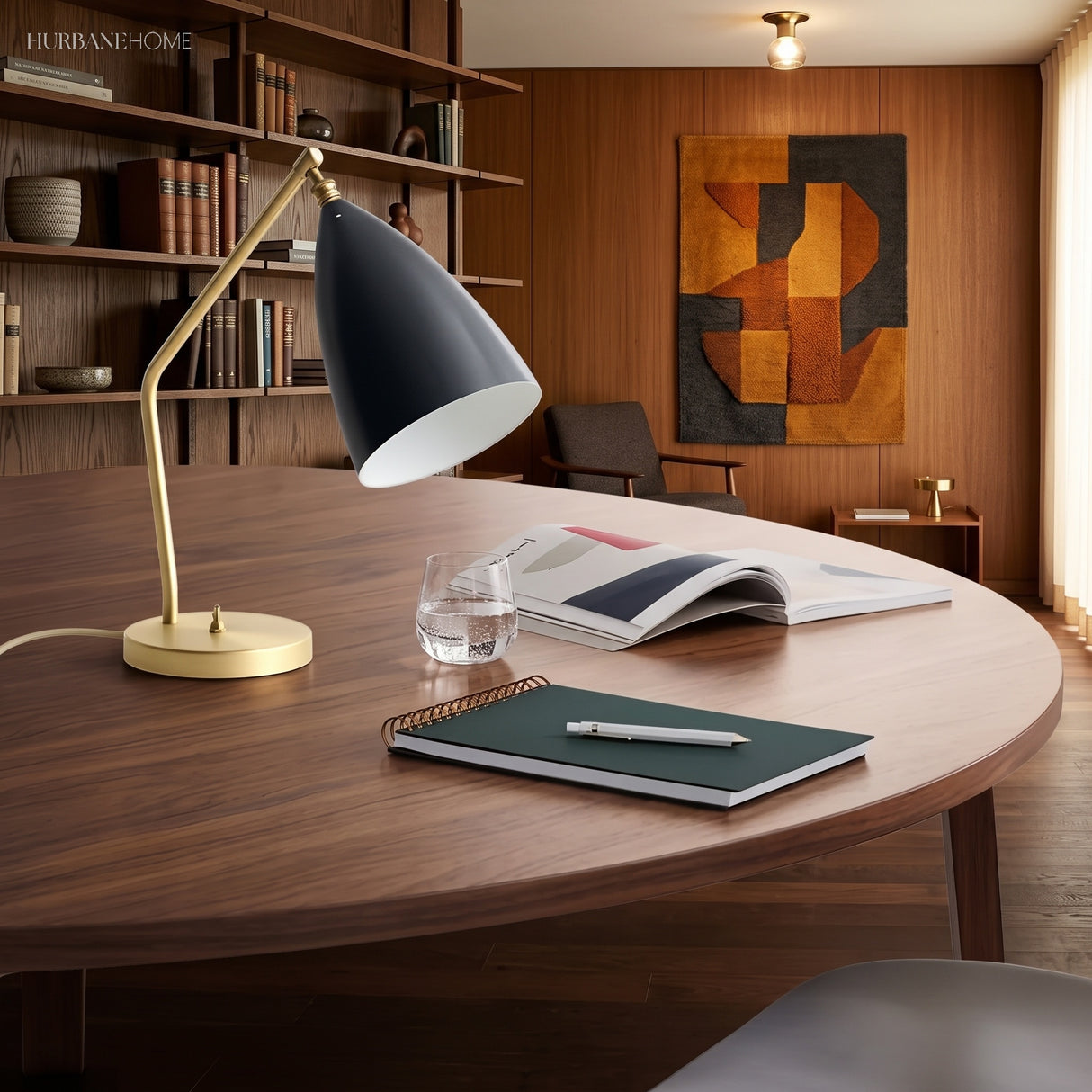 Black brass task table lamp on a marble desk