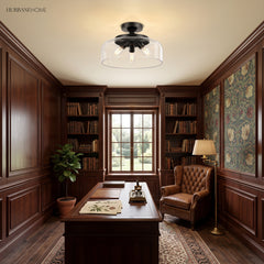 Black glass semi flush mount ceiling light in a wood-panelled study