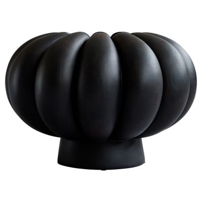 Sculptural pedestal ceramic vase styled with dried botanical stems