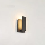 Black LED wall sconce mounted outdoors on exterior wall