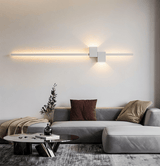 Black linear LED sconce shown at full length on a wall
