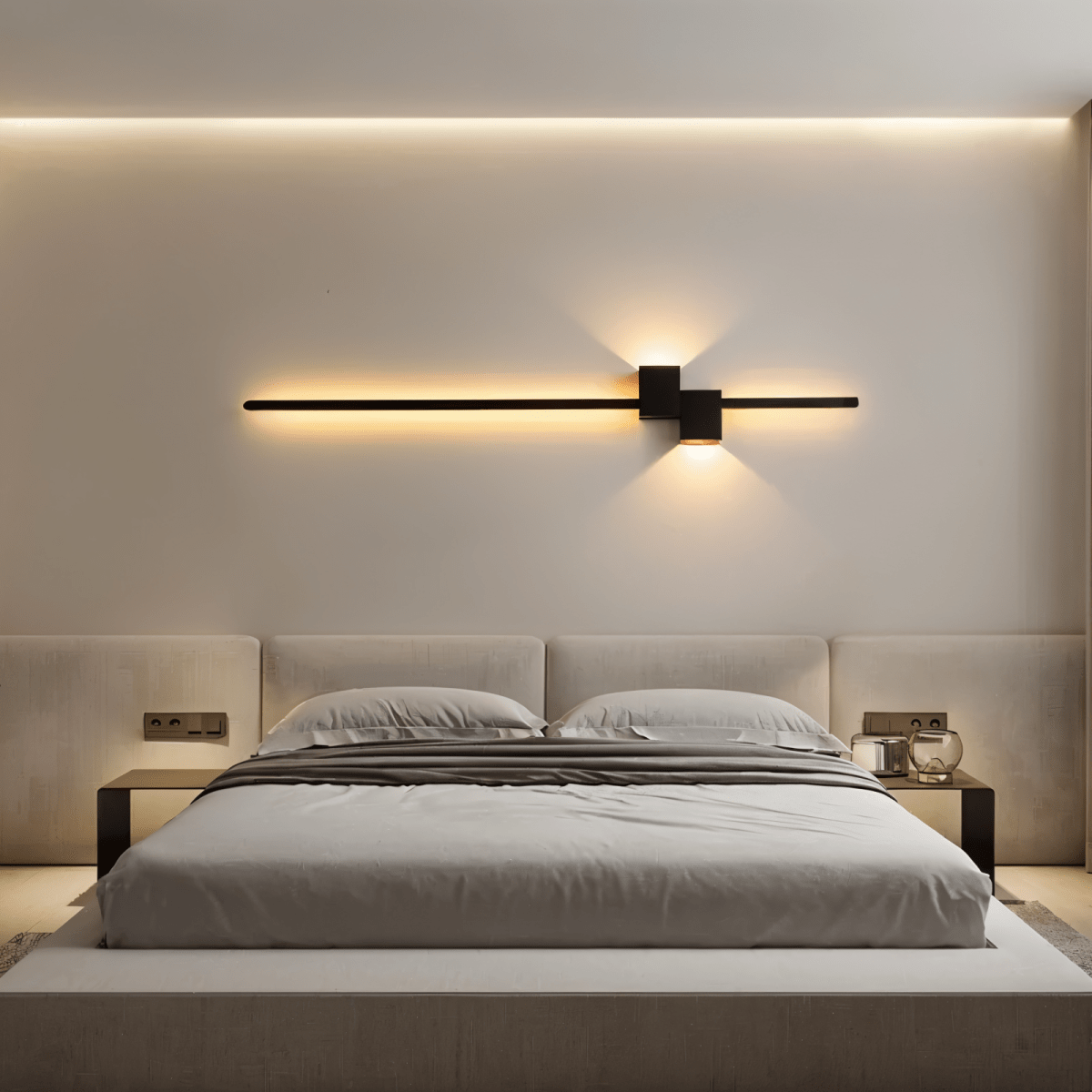 Black minimalist LED wall sconce packaged with mounting hardware