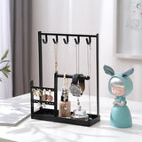 Black Jewelry Display Rack Stand organizing earrings and bracelets neatly