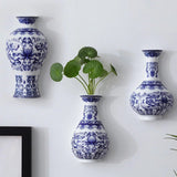 Blue and White Porcelain Wall Vase with Classic Floral Design - Hurbane Home