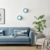 Blue orb wall sconce side profile against a plain light background