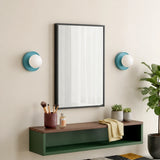 Blue orb wall sconce top angle showing the globe seated in the ring