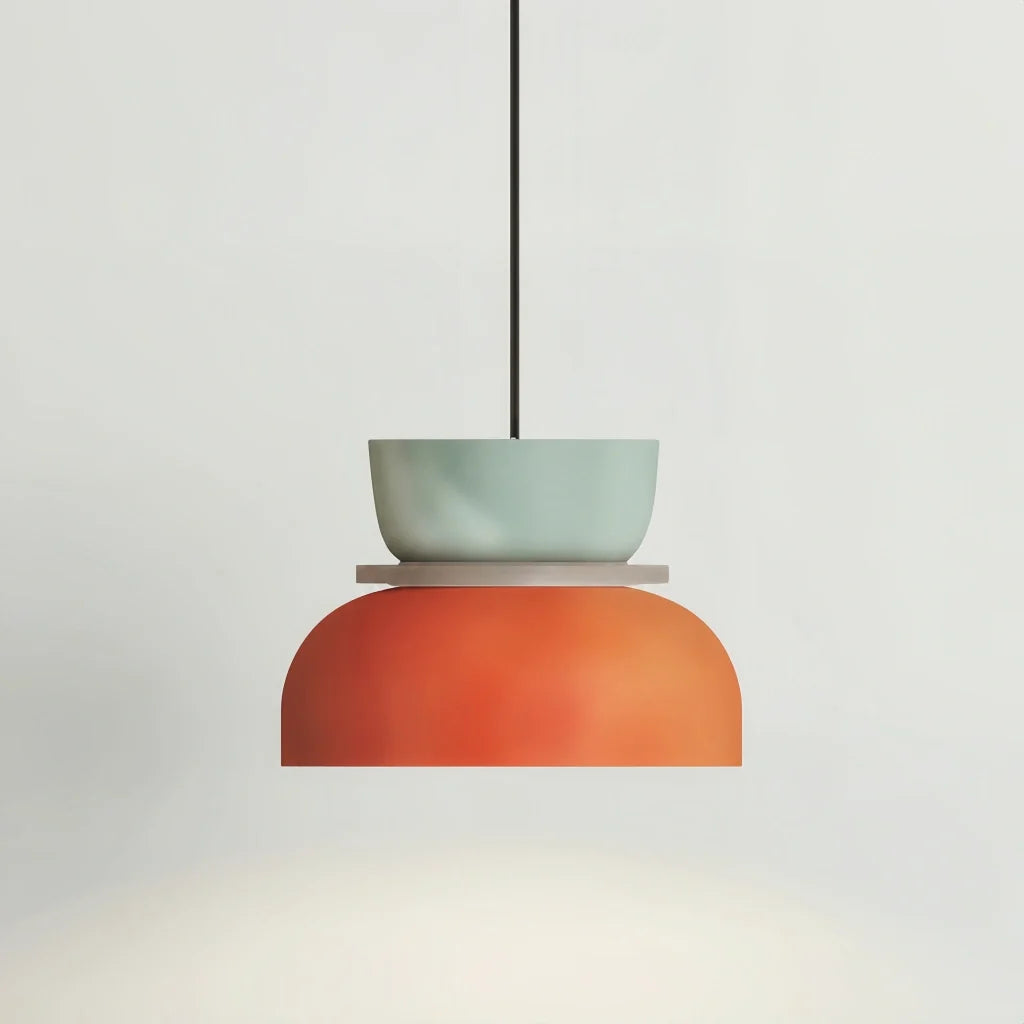 Light blue and orange bowl pendant light on a clean studio-white background