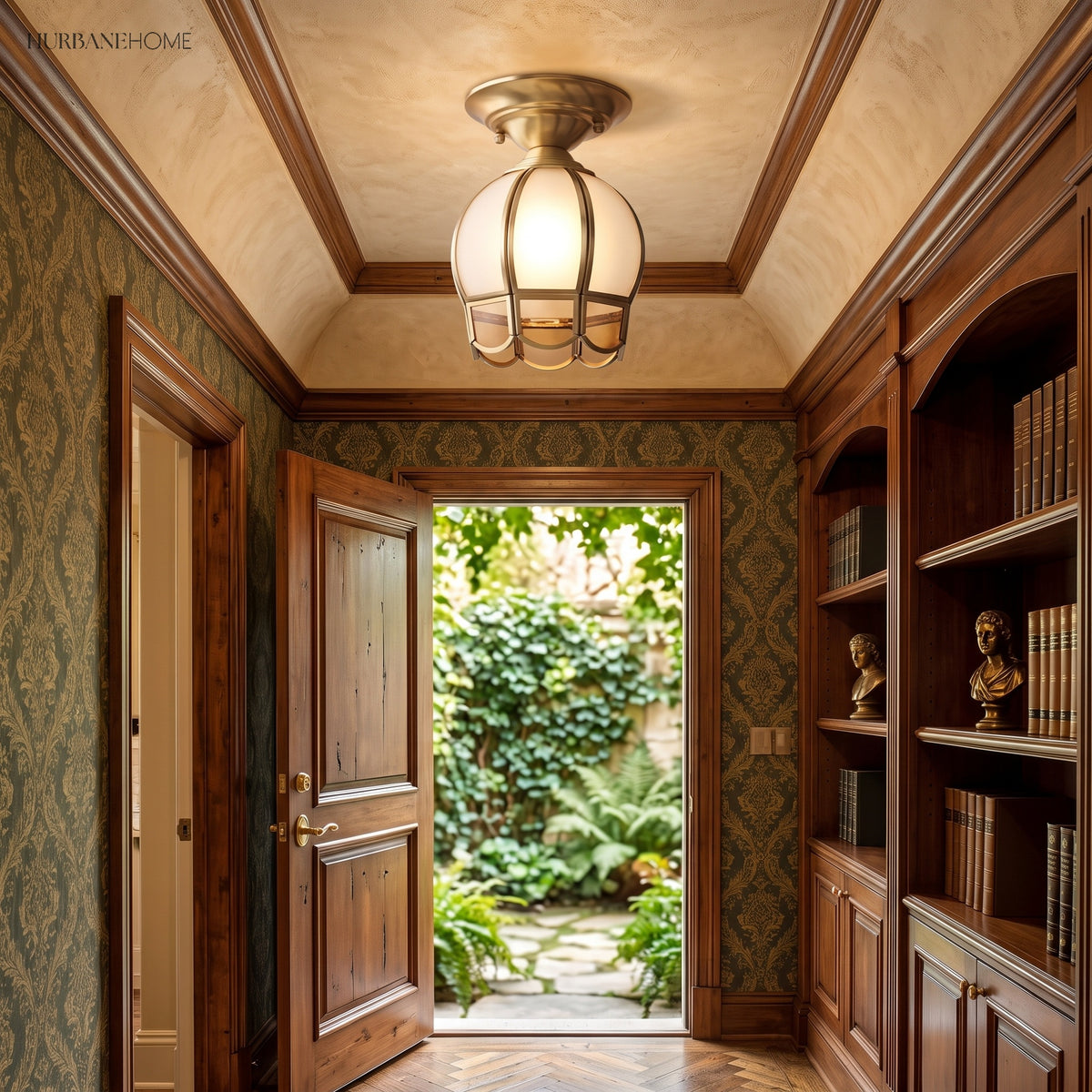 Caged glass ceiling light lit in a panelled hallway by a doorway