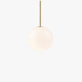 Opal glass globe pendant on a rigid brass stem, gold finish, view 1