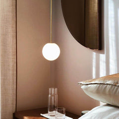 Glass globe pendant with a fixed 39.4 inch brass rod drop, view 3