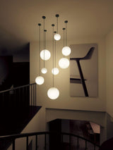 Glass globe pendant with a fixed 39.4 inch brass rod drop, view 9
