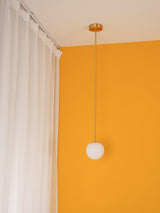 Modern globe pendant light on a rigid stem for kitchen islands, view 12