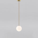 Brass rod pendant light with a 3.6 inch opal glass globe, view 17