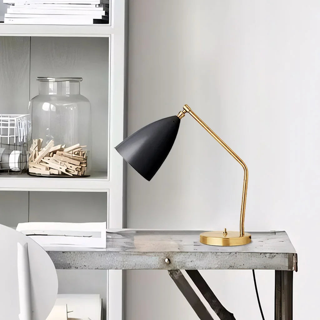 Brass table lamp weighted round base detail