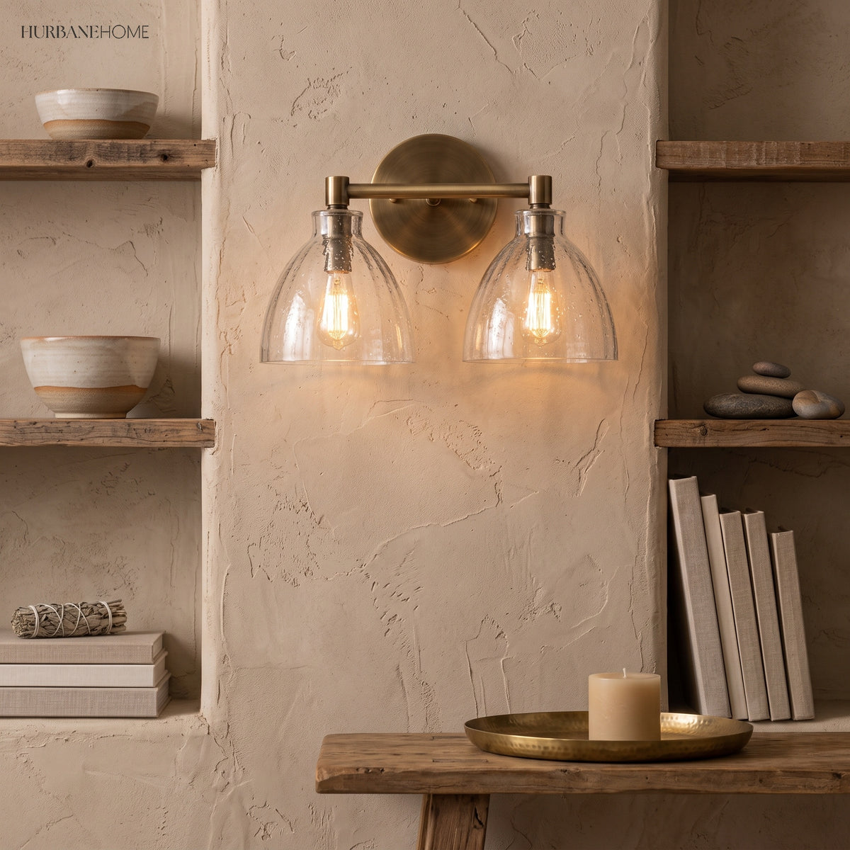 Three dome shades on a brass bar above a farmhouse kitchen sink