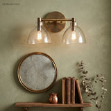Close view of the textured glass dome and exposed filament bulb