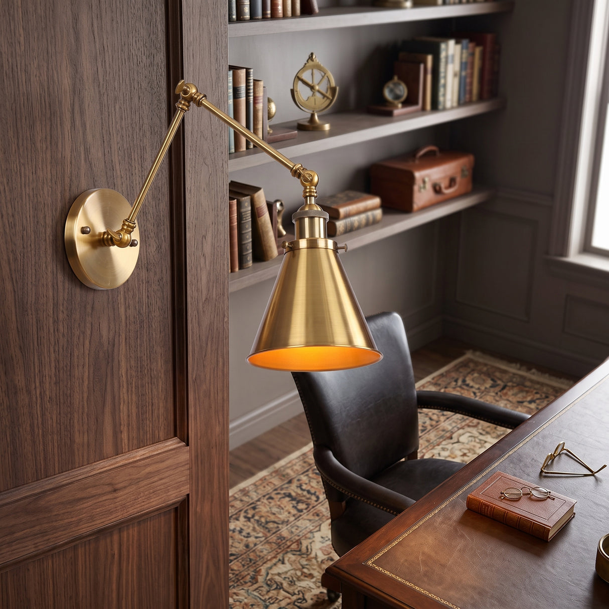 Brass swing arm sconce with a cone shade in a panelled study