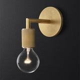 Angled view of the bare bulb sconce showing its bronze arm