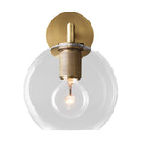 Clear glass globe shade sconce photographed on a white background