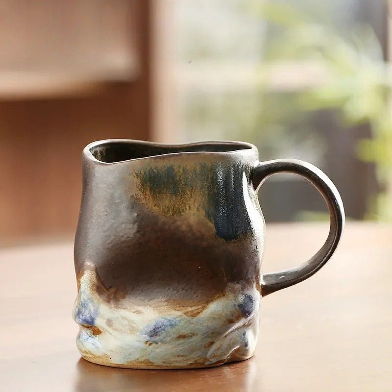 brown ceramic vintage coffee cup