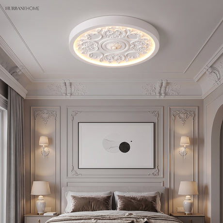 Carved relief LED flush mount ceiling light in a styled interior