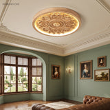 Carved relief LED flush mount ceiling light in a styled interior
