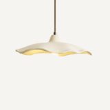 Cement flower pendant light unlit on a plain white studio background