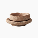 Rustic ceramic flower vase on wooden tabletop