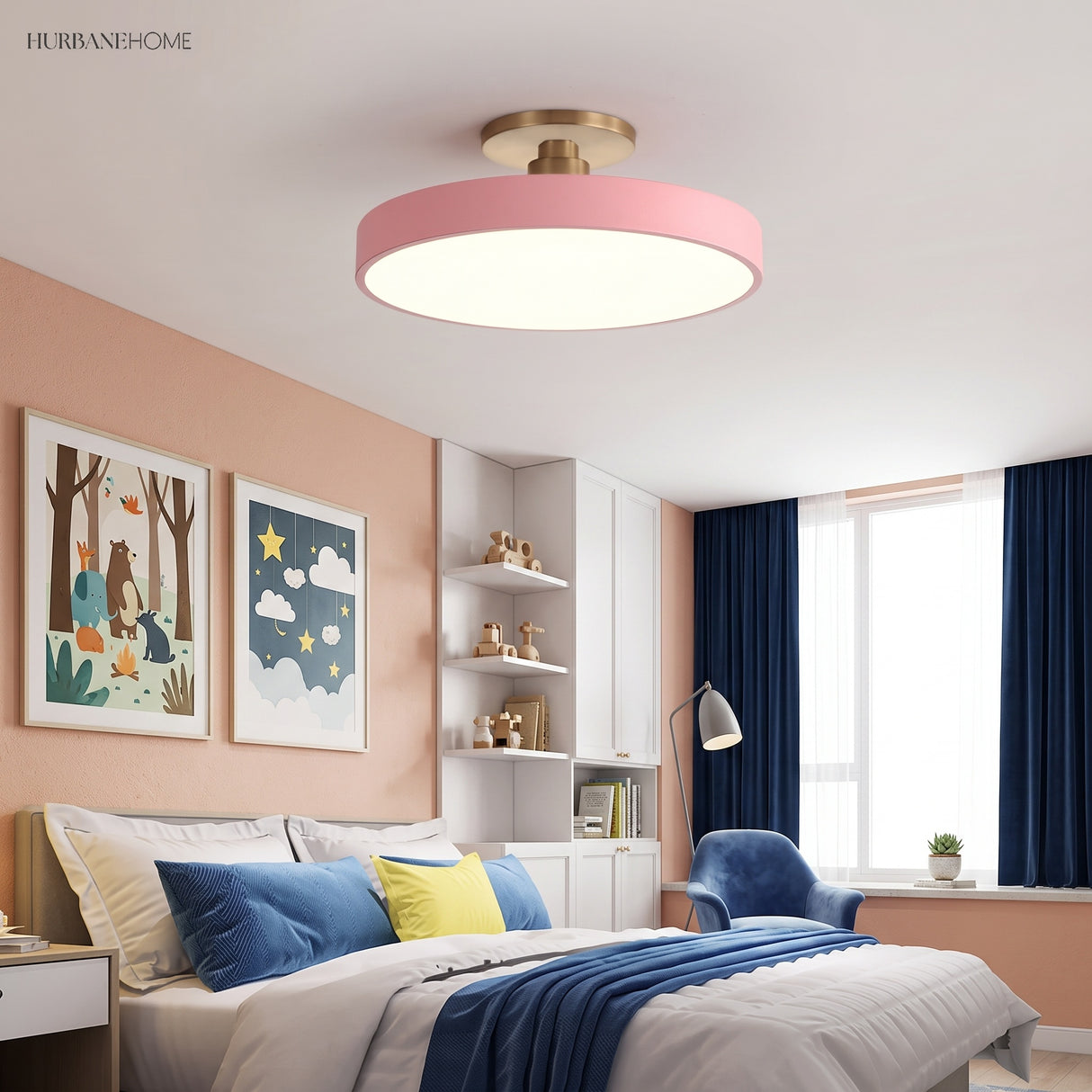 Pink circular ceiling light in a children's bedroom with blue bedding