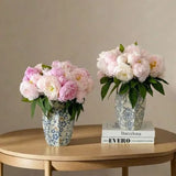 Classic porcelain vase accent with glossy glaze on tabletop