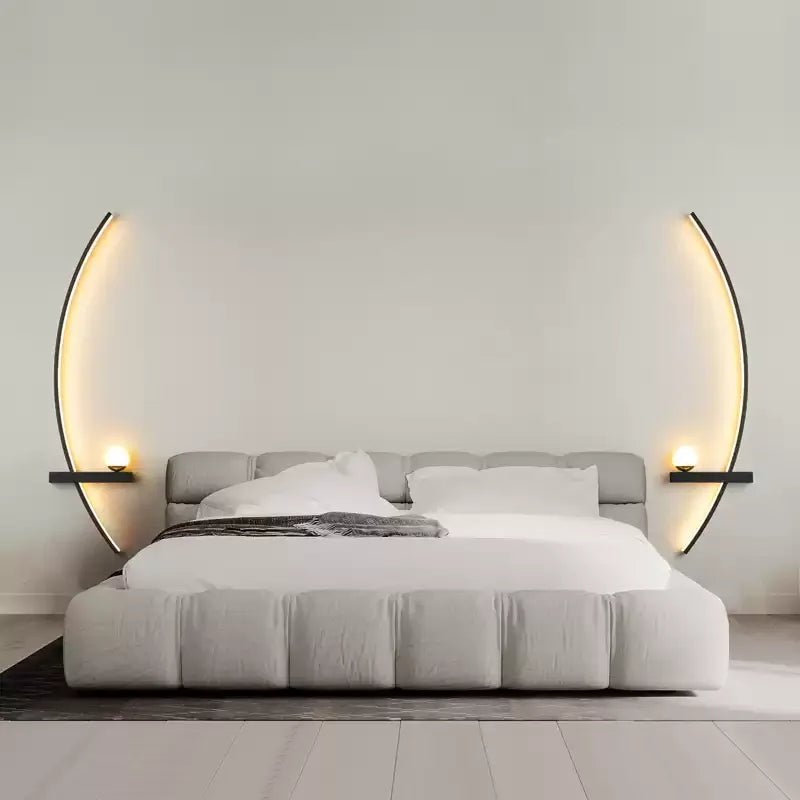 Minimalist wall light glowing softly in a clean grey bedroom