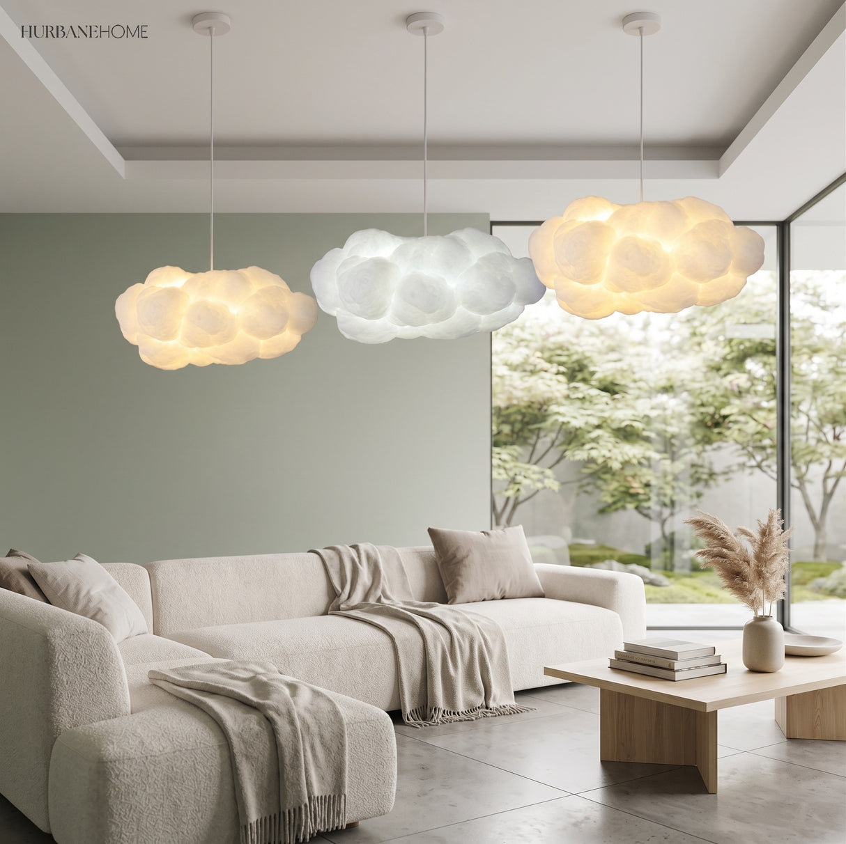 Cloud pendant light over a sofa in a contemporary living room