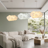 Cloud pendant light over a sofa in a contemporary living room