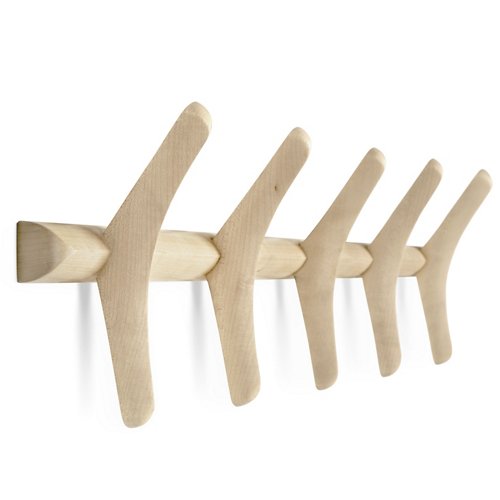 Close up of sculpted hooks on coat rack wooden design