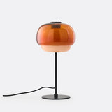 First colourway of the domed glass table lamp on a metal stem