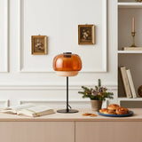 Pink glass domed shade table lamp with round weighted metal base