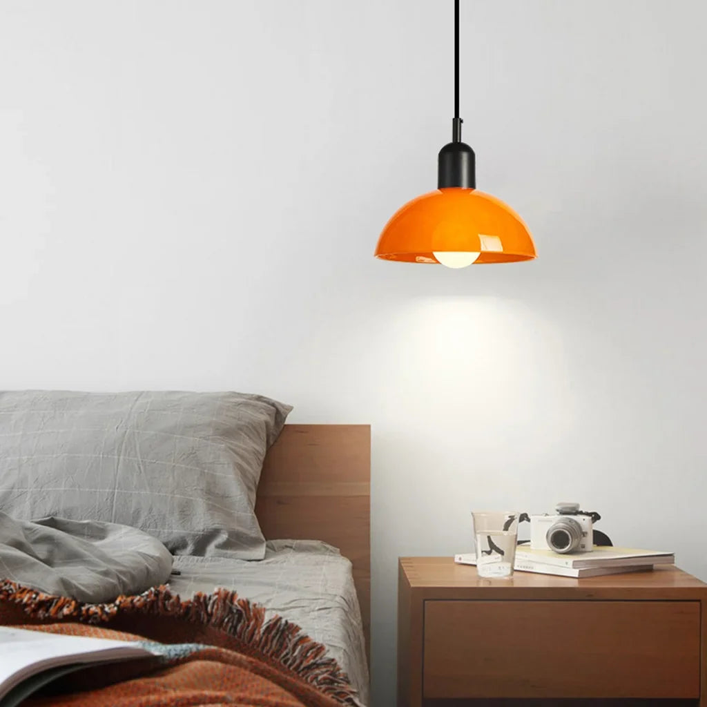 Colorful bowl pendant lights grouped to show the range of shade colours
