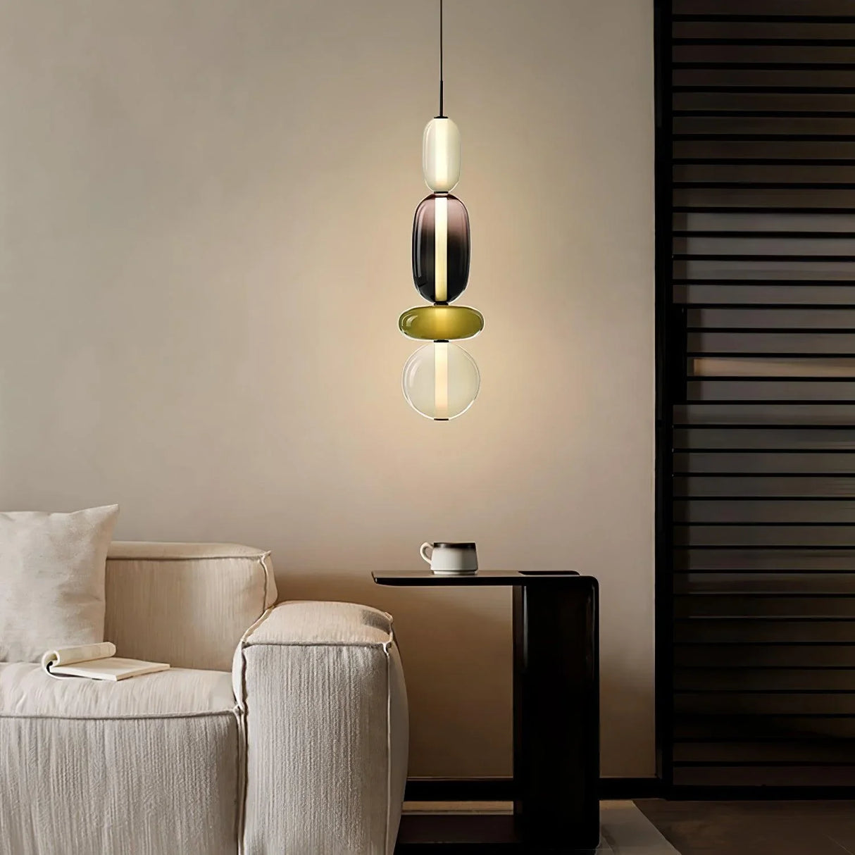 Colorful glass pendant light close view highlighting the integrated LED tube
