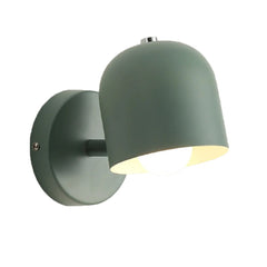 White macaron wall sconce on a plain grey studio background