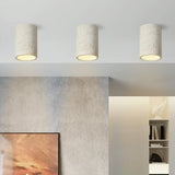Textured composite ceiling light with diffused LED lighting, product angle view