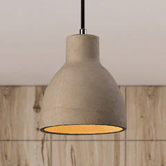 Cement barn pendant lit low over a timber counter and panelling